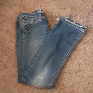 Slightly distressed bell bottom jeans